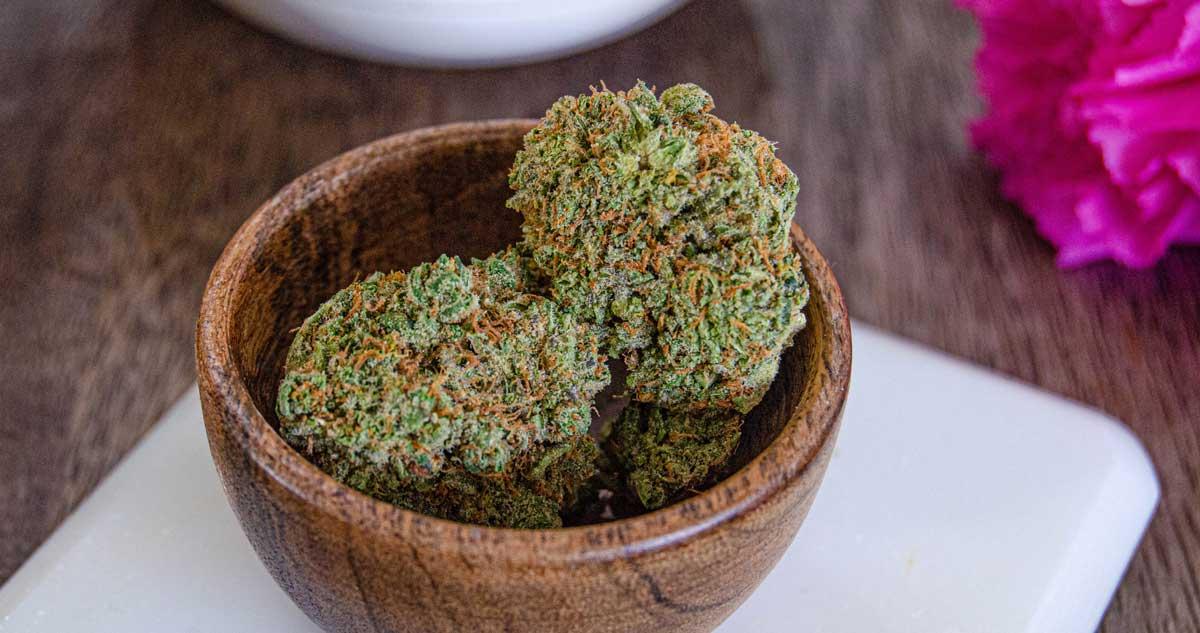 MUV Cannabis flower in a medicine bowl